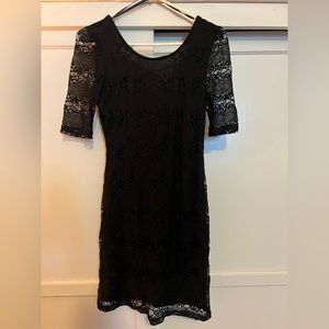 Little lacy, open back dress. Perfect for date night